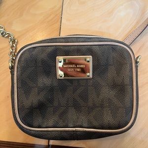 Michael kors cross body brown bag.